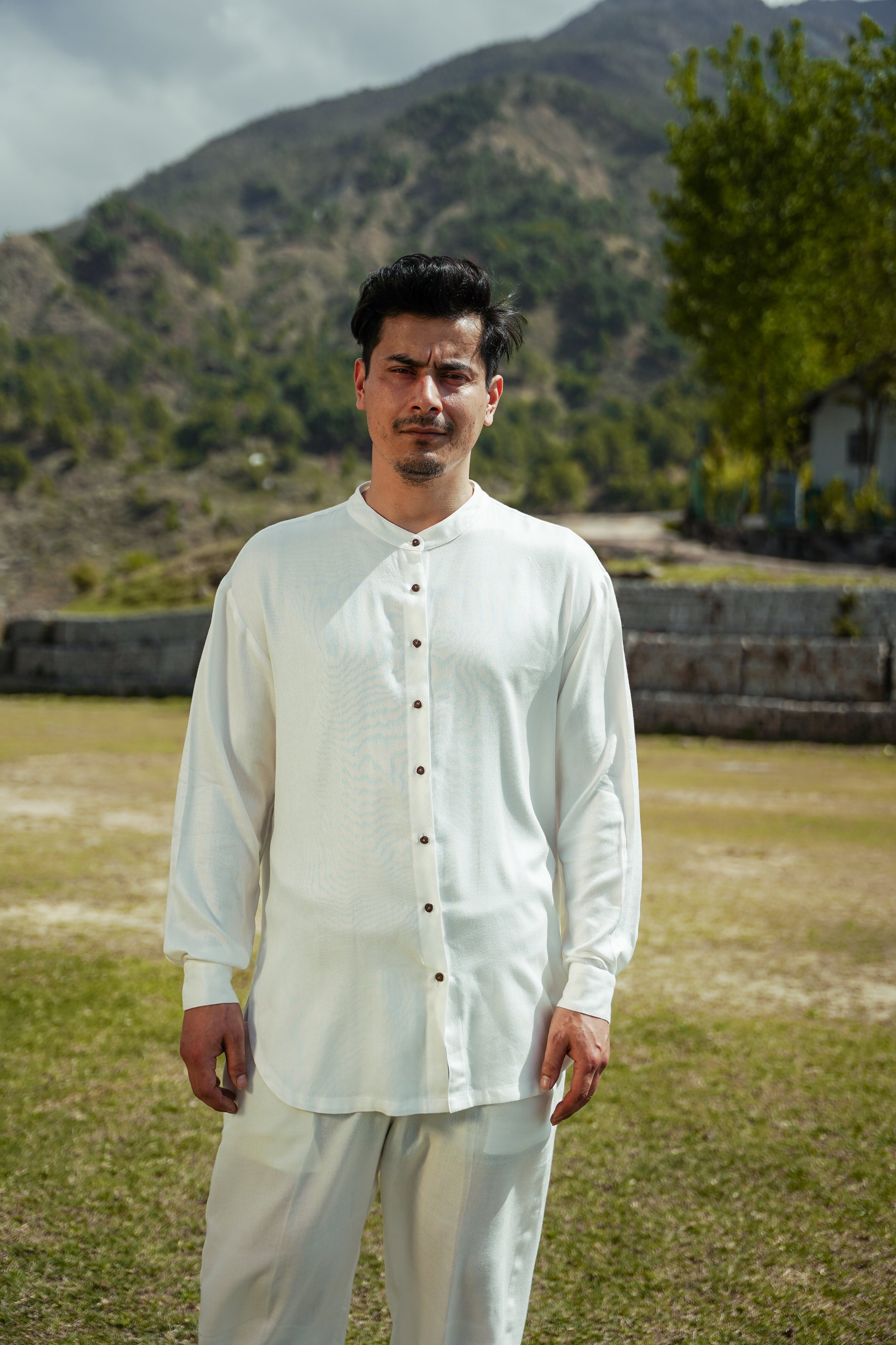 L.12 Unisex Chinese Collar Shirt with Side Split and Pocket Details in Whakato L.12 Unisex Chinese Collar Shirt with Side Split and Pocket Details in Whakato
